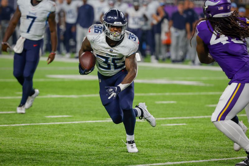 Tennessee Titans running back Julius Chestnut (36) rushes against the Minnesota Vikings in the second half of a preseason NFL football game, Saturday, Aug. 19, 2023, in Minneapolis. (AP Photo/Bruce Kluckhohn)