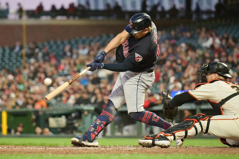 Sep 11, 2023; San Francisco, California, USA; Cleveland Guardians infielder Josh Naylor (22) hits a two run home run into McCovey Cove against the San Francisco Giants during the third inning at Oracle Park. Mandatory Credit: Robert Edwards-USA TODAY Sports