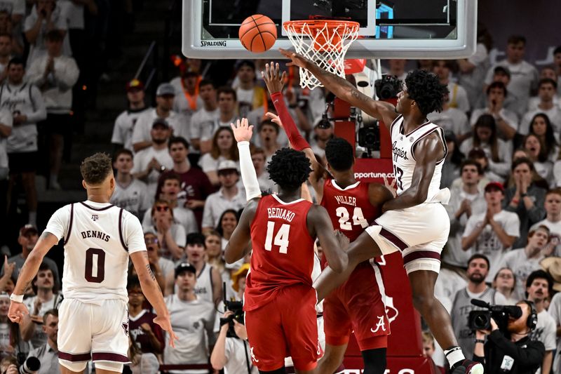 Mar 4, 2023; College Station, Texas, USA; Texas A&M Aggies forward Solomon Washington (13) blocks the shot of Alabama Crimson Tide forward Brandon Miller (24) during the second half at Reed Arena. Mandatory Credit: Maria Lysaker-USA TODAY Sports