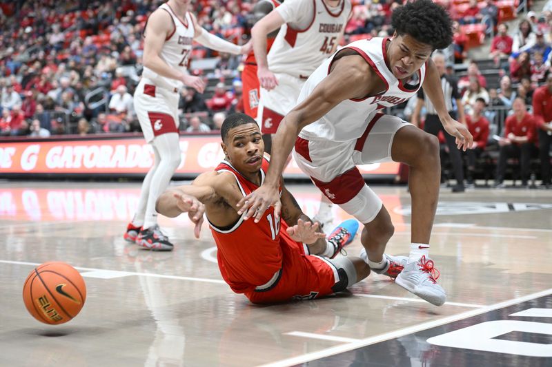 Jan 13, 2024; Pullman, Washington, USA; Washington State Cougars forward Jaylen Wells (0) chases the ball against Arizona Wildcats forward Keshad Johnson (16) in the first half at Friel Court at Beasley Coliseum. Mandatory Credit: James Snook-USA TODAY Sports