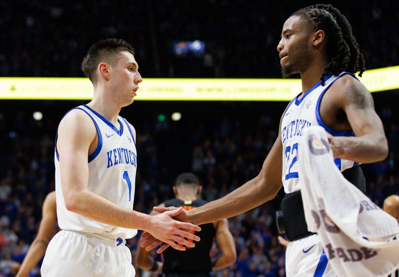 Feb 4, 2023; Lexington, Kentucky, USA; Kentucky Wildcats guard CJ Fredrick (1) greets guard Cason Wallace (22) at the end of the first half against the Florida Gators at Rupp Arena at Central Bank Center. Mandatory Credit: Jordan Prather-USA TODAY Sports