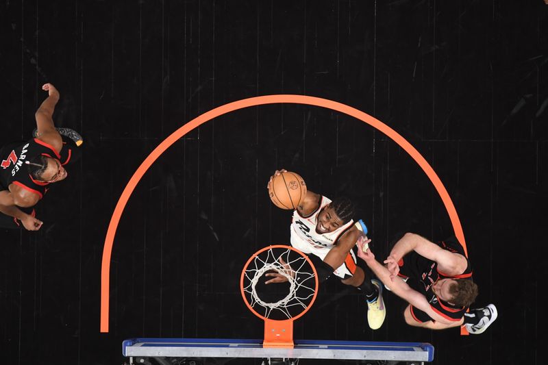 DETROIT, MI - NOVEMBER 24: Jaden Ivey #23 of the Detroit Pistons drives to the basket during the game against the Toronto Raptors on November 24, 2024 at Little Caesars Arena in Detroit, Michigan. NOTE TO USER: User expressly acknowledges and agrees that, by downloading and/or using this photograph, User is consenting to the terms and conditions of the Getty Images License Agreement. Mandatory Copyright Notice: Copyright 2024 NBAE (Photo by Chris Schwegler/NBAE via Getty Images)