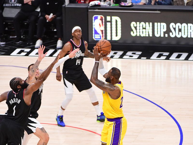 LOS ANGELES, CA - FEBRUARY 28:  LeBron James #23 of the Los Angeles Lakers shoots a 3-point basket during the game  on February 28, 2024 at Crypto.Com Arena in Los Angeles, California. NOTE TO USER: User expressly acknowledges and agrees that, by downloading and/or using this Photograph, user is consenting to the terms and conditions of the Getty Images License Agreement. Mandatory Copyright Notice: Copyright 2024 NBAE (Photo by Adam Pantozzi/NBAE via Getty Images)