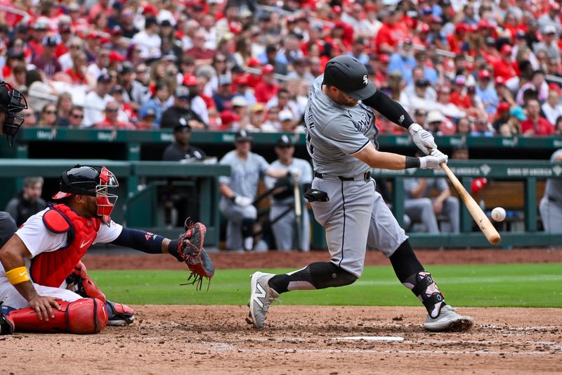 May 5, 2024; St. Louis, Missouri, USA;  Chicago White Sox left fielder Robbie Grossman (30) hits a one run sacrifice fly against the St. Louis Cardinals during the seventh inning at Busch Stadium. Mandatory Credit: Jeff Curry-USA TODAY Sports