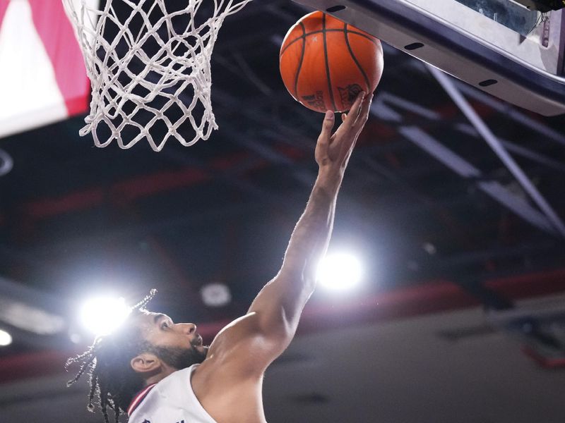 Jan 2, 2024; Boca Raton, Florida, USA; Florida Atlantic Owls guard Jalen Gaffney (12) shoots against the East Carolina Pirates during the second half at Eleanor R. Baldwin Arena. Mandatory Credit: Rich Storry-USA TODAY Sports