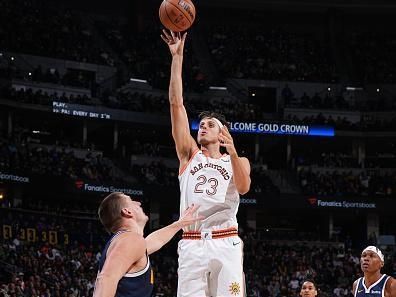 DENVER, CO - NOVEMBER 26: Zach Collins #23 of the San Antonio Spurs shoots the ball during the game against the Denver Nuggets on November 26, 2023 at the Ball Arena in Denver, Colorado. NOTE TO USER: User expressly acknowledges and agrees that, by downloading and/or using this Photograph, user is consenting to the terms and conditions of the Getty Images License Agreement. Mandatory Copyright Notice: Copyright 2023 NBAE (Photo by Garrett Ellwood/NBAE via Getty Images)