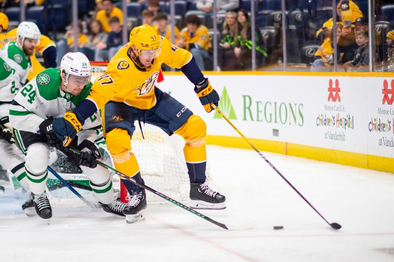 Feb 15, 2024; Nashville, Tennessee, USA; Nashville Predators goaltender Juuse Saros (74) skates with the puck  against the Dallas Stars during the third period at Bridgestone Arena. Mandatory Credit: Steve Roberts-USA TODAY Sports