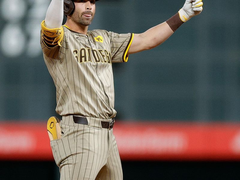 Apr 22, 2024; Denver, Colorado, USA; San Diego Padres third base Tyler Wade (14) reacts from second after hitting an RBI double in the eighth inning against the Colorado Rockies at Coors Field. Mandatory Credit: Isaiah J. Downing-USA TODAY Sports