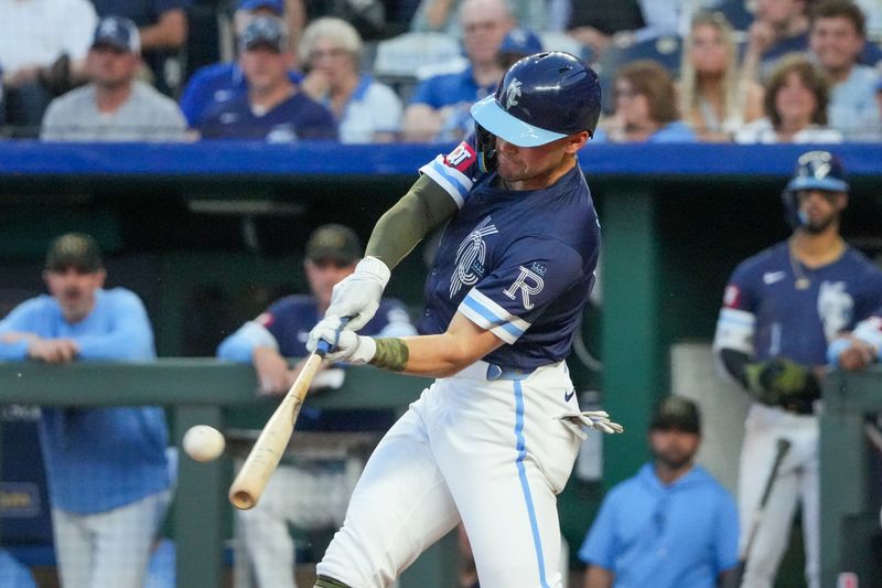 May 17, 2024; Kansas City, Missouri, USA; Kansas City Royals second baseman Michael Massey (19) hits a two-run home run against the Oakland Athletics in the sixth inning at Kauffman Stadium. Mandatory Credit: Denny Medley-USA TODAY Sports