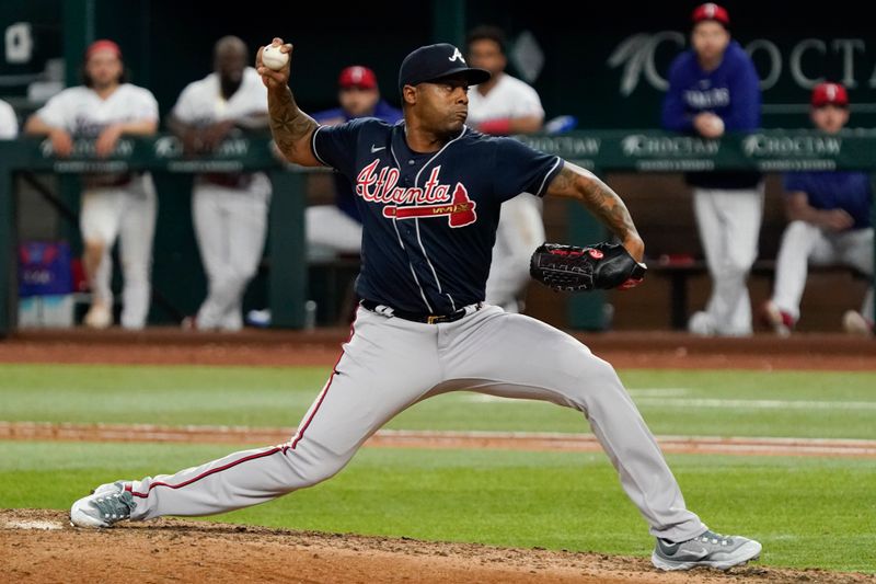 May 17, 2023; Arlington, Texas, USA; Atlanta Braves relief pitcher Raisel Iglesias (26) throws to the plate against the Texas Rangers during the ninth inning at Globe Life Field. Mandatory Credit: Raymond Carlin III-USA TODAY Sports