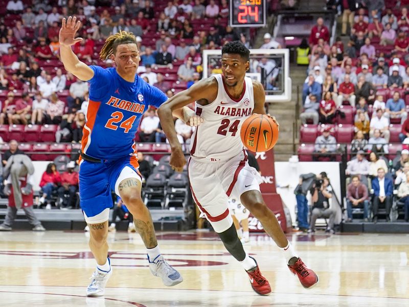 Feb 8, 2023; Tuscaloosa, Alabama, USA; Alabama Crimson Tide forward Brandon Miller (24) drives against Florida Gators guard Riley Kugel (24) during the second half at Coleman Coliseum. Mandatory Credit: Marvin Gentry-USA TODAY Sports