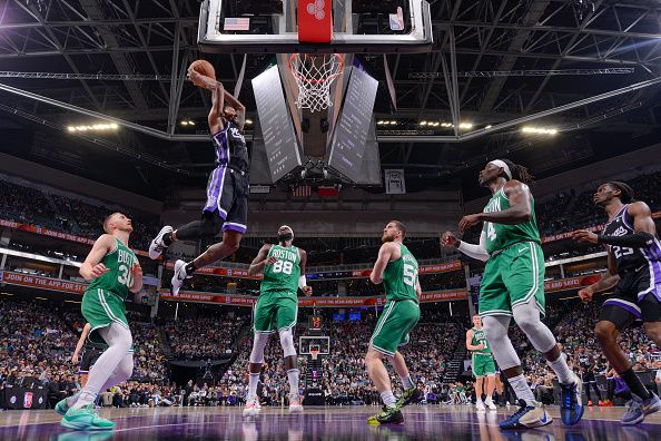 SACRAMENTO, CA - DECEMBER 20:  Malik Monk #0 of the Sacramento Kings goes to the basket during the game on December 20, 2023 at Golden 1 Center in Sacramento, California. NOTE TO USER: User expressly acknowledges and agrees that, by downloading and or using this Photograph, user is consenting to the terms and conditions of the Getty Images License Agreement. Mandatory Copyright Notice: Copyright 2023 NBAE (Photo by Rocky Widner/NBAE via Getty Images)