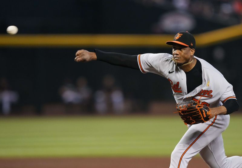 Sep 3, 2023; Phoenix, Arizona, USA; Baltimore Orioles relief pitcher Yennier Cano (78) pitches against the Arizona Diamondbacks during the ninth inning at Chase Field. Mandatory Credit: Joe Camporeale-USA TODAY Sports