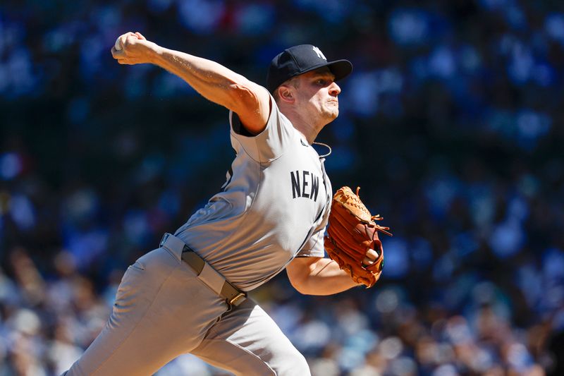 Sep 7, 2024; Chicago, Illinois, USA; New York Yankees starting pitcher Clarke Schmidt (36) delivers a pitch against the Chicago Cubs during the first inning at Wrigley Field. Mandatory Credit: Kamil Krzaczynski-Imagn Images