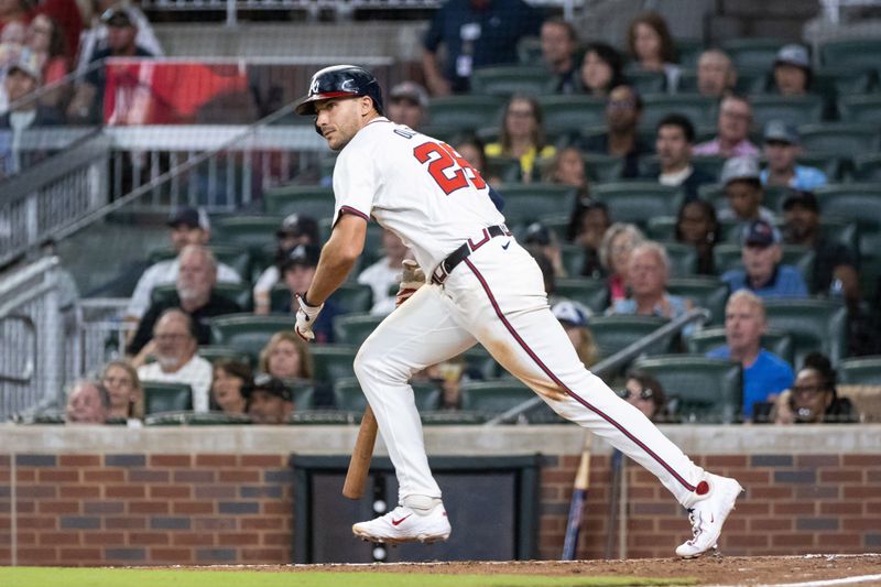 Aug 22, 2024; Cumberland, Georgia, USA; Atlanta Braves first base Matt Olson (28) runs to first base after hitting a ground ball against Philadelphia Phillies during the seventh inning at Truist Park. Mandatory Credit: Jordan Godfree-USA TODAY Sports