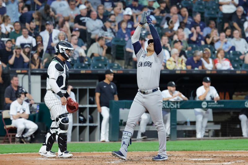 Aug 13, 2024; Chicago, Illinois, USA; New York Yankees outfielder Juan Soto (22) crosses home plate after hitting a two-run home run against the Chicago White Sox during the third inning at Guaranteed Rate Field. Mandatory Credit: Kamil Krzaczynski-USA TODAY Sports