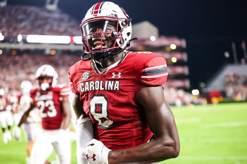 Sep 9, 2023; Columbia, South Carolina, USA; South Carolina Gamecocks wide receiver Nyck Harbor (8) celebrates a touchdown during the third quarter at Williams-Brice Stadium. Mandatory Credit: Jeff Blake-USA TODAY Sports