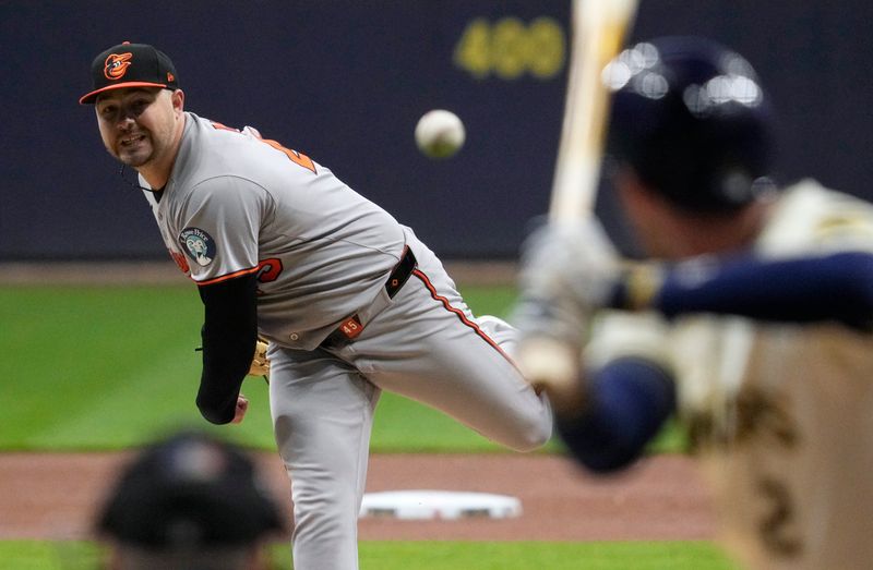 May 20, 2025; Milwaukee, Wisconsin, USA; Baltimore Orioles pitcher Keegan Akin (45) delivers a pitch against the Milwaukee Brewers in the first inning at American Family Field. Mandatory Credit: Michael McLoone-Imagn Images