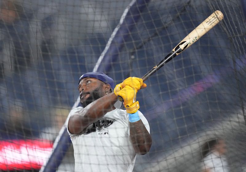 Jul 24, 2024; Toronto, Ontario, CAN; Tampa Bay Rays left fielder Randy Arozarena (56) takes batting practice before a game against the Toronto Blue Jays at Rogers Centre. Mandatory Credit: Nick Turchiaro-USA TODAY Sports