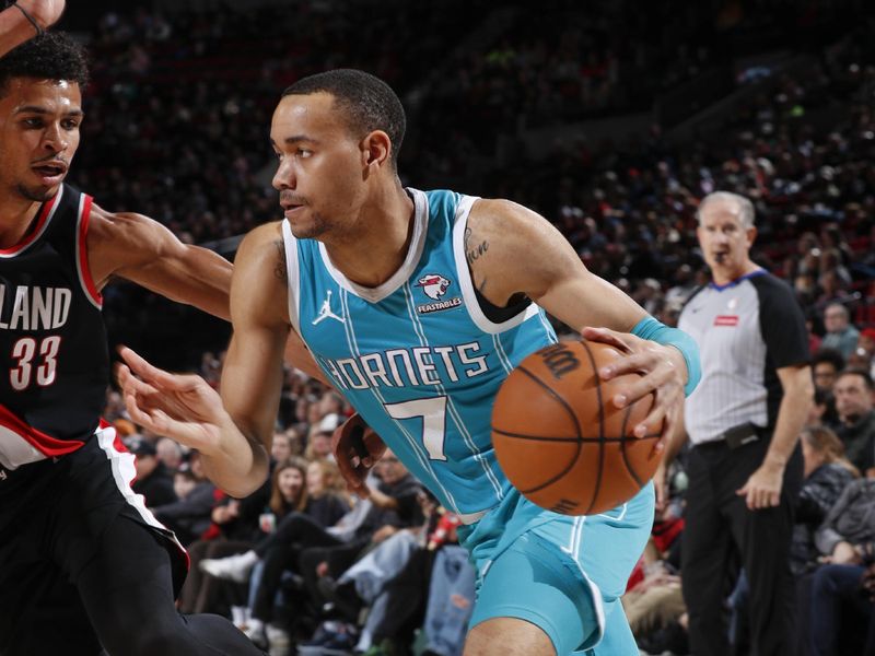 PORTLAND, OR - FEBRUARY 25:  Bryce McGowans #7 of the Charlotte Hornets goes to the basket during the game on February 25, 2024 at the Moda Center Arena in Portland, Oregon. NOTE TO USER: User expressly acknowledges and agrees that, by downloading and or using this photograph, user is consenting to the terms and conditions of the Getty Images License Agreement. Mandatory Copyright Notice: Copyright 2024 NBAE (Photo by Cameron Browne/NBAE via Getty Images)