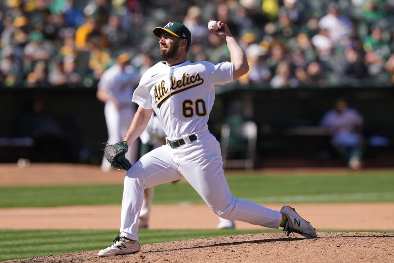 Apr 16, 2023; Oakland, California, USA; Oakland Athletics relief pitcher Sam Moll (60) throws a pitch against the New York Mets during the tenth inning at RingCentral Coliseum. Mandatory Credit: Darren Yamashita-USA TODAY Sports