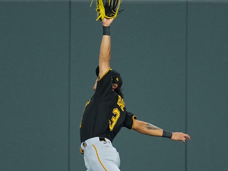 Aug 30, 2023; Kansas City, Missouri, USA; Pittsburgh Pirates second baseman Ji Hwan Bae (3) leaps for a triple hit by Kansas City Royals third baseman Maikel Garcia (not pictured) during the ninth inning at Kauffman Stadium. Mandatory Credit: Jay Biggerstaff-USA TODAY Sports