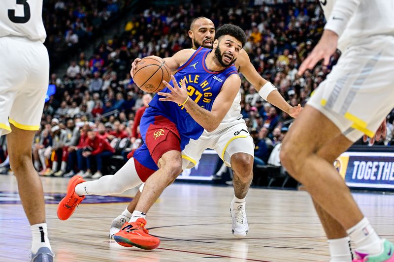 DENVER, COLORADO - MARCH 9: Jamal Murray #27 of the Denver Nuggets drives to the basket against the Utah Jazz in the first half at Ball Arena on March 9, 2024 in Denver, Colorado. (Photo by Dustin Bradford/Getty Images)