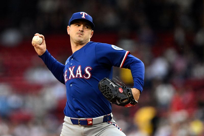 May 7, 2025; Boston, Massachusetts, USA; Texas Rangers starting pitcher Tyler Mahle (51) pitches against the Boston Red Sox during the first inning at Fenway Park. Mandatory Credit: Brian Fluharty-Imagn Images