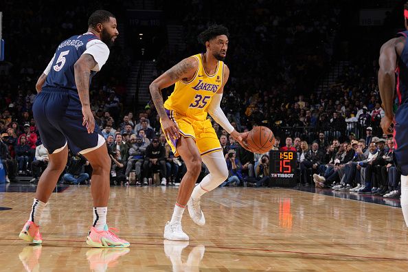 PHILADELPHIA, PA - NOVEMBER 27: Christian Wood #35 of the Los Angeles Lakers dribbles the ball during the game against the Philadelphia 76ers on November 27, 2023 at the Wells Fargo Center in Philadelphia, Pennsylvania NOTE TO USER: User expressly acknowledges and agrees that, by downloading and/or using this Photograph, user is consenting to the terms and conditions of the Getty Images License Agreement. Mandatory Copyright Notice: Copyright 2023 NBAE (Photo by Jesse D. Garrabrant/NBAE via Getty Images)