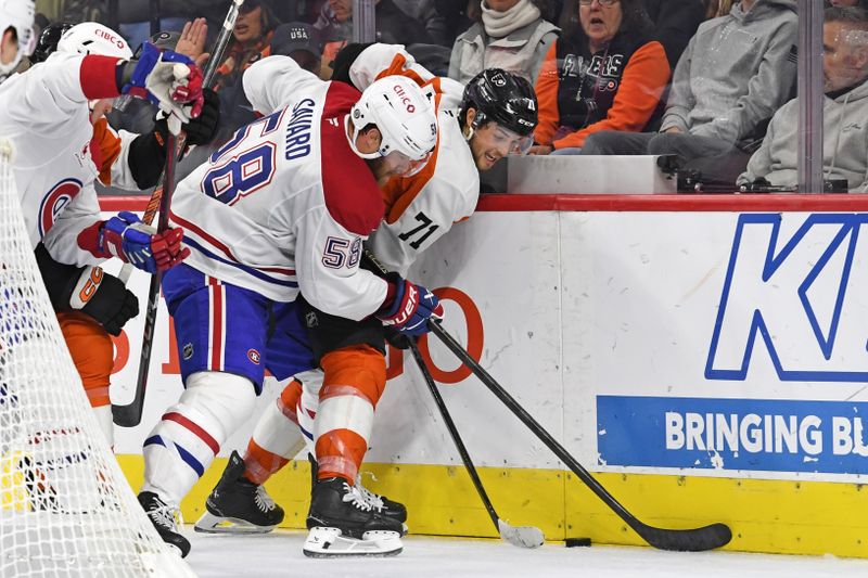 Oct 27, 2024; Philadelphia, Pennsylvania, USA; Montreal Canadiens defenseman David Savard (58) and Philadelphia Flyers right wing Tyson Foerster (71) battle for the puck during the second period at Wells Fargo Center. Mandatory Credit: Eric Hartline-Imagn Images