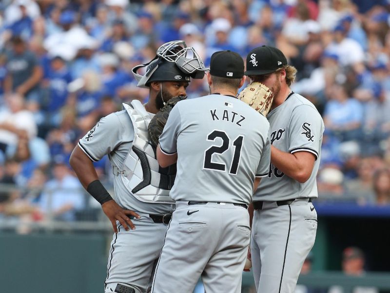 3Jul 20, 2024; Kansas City, Missouri, USA; Chicago White Sox pitching coach Ethan Katz (21) and catcher Chuck Robinson (47) visit with starting pitcher Jonathan Cannon (48) during the bottom of the second inning against the Kansas City Royals at Kauffman Stadium. Mandatory Credit: Scott Sewell-USA TODAY Sports