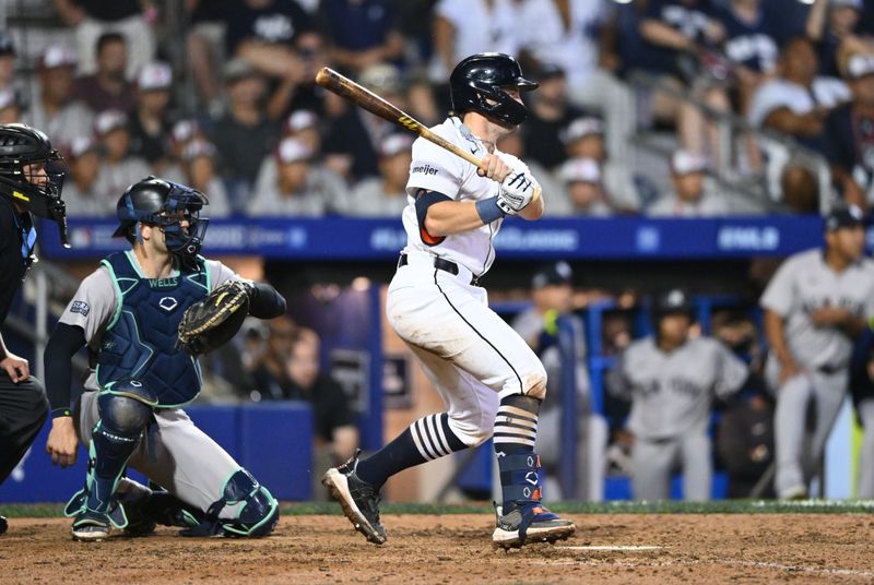 Aug 18, 2024; Williamsport, Pennsylvania, USA; Detroit Tigers infielder Jace Jung (17) hits an RBI single against the New York Yankees in the ninth inning at BB&T Ballpark at Historic Bowman Field. Mandatory Credit: Kyle Ross-USA TODAY Sports