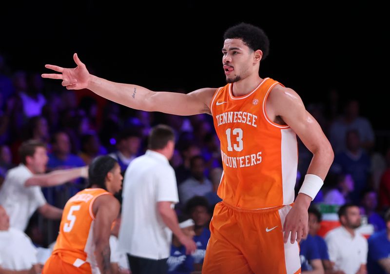 Nov 25, 2022; Paradise Island, BAHAMAS; Tennessee Volunteers forward Olivier Nkamhoua (13) reacts after scoring during the first half against the Kansas Jayhawks at Imperial Arena. Mandatory Credit: Kevin Jairaj-USA TODAY Sports