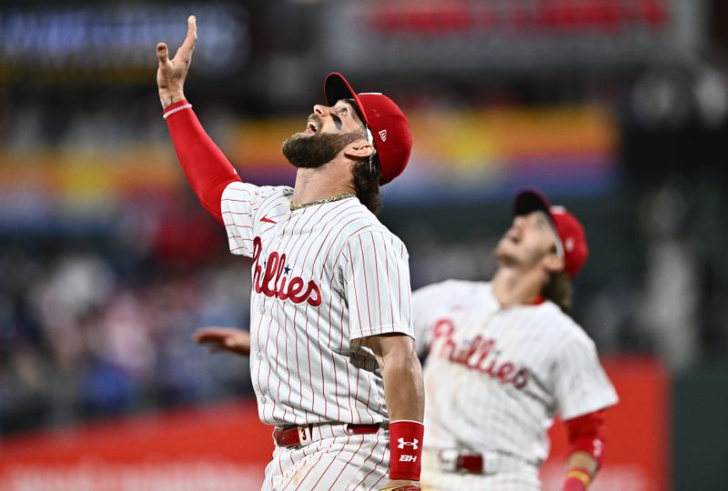 May 5, 2024; Philadelphia, Pennsylvania, USA; Philadelphia Phillies first baseman Bryce Harper (3) and second baseman Bryson Stott (5) track a fly ball against the San Francisco Giants in the ninth inning at Citizens Bank Park. Mandatory Credit: Kyle Ross-USA TODAY Sports