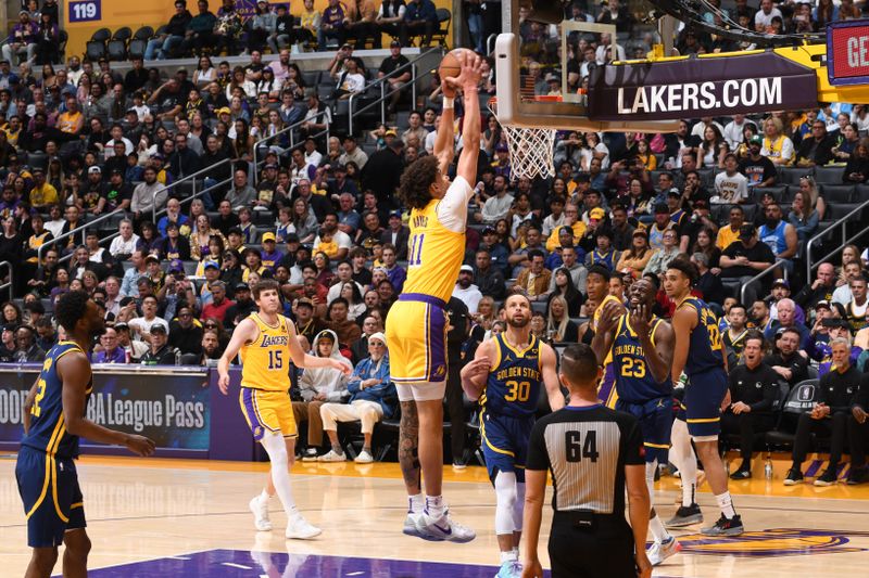 LOS ANGELES, CA - APRIL 9: Jaxson Hayes #11 of the Los Angeles Lakers dunks the ball during the game against the Golden State Warriors on April 9, 2024 at Crypto.Com Arena in Los Angeles, California. NOTE TO USER: User expressly acknowledges and agrees that, by downloading and/or using this Photograph, user is consenting to the terms and conditions of the Getty Images License Agreement. Mandatory Copyright Notice: Copyright 2024 NBAE (Photo by Andrew D. Bernstein/NBAE via Getty Images)