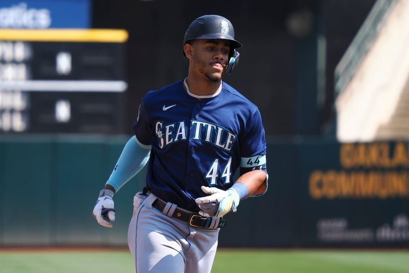 Sep 20, 2023; Oakland, California, USA; Seattle Mariners center fielder Julio Rodriguez (44) rounds the bases on a solo home run against the Oakland Athletics during the fifth inning at Oakland-Alameda County Coliseum. Mandatory Credit: Kelley L Cox-USA TODAY Sports