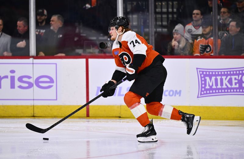 Nov 28, 2023; Philadelphia, Pennsylvania, USA; Philadelphia Flyers right wing Owen Tippett (74) controls the puck against the Carolina Hurricanes in the first period at Wells Fargo Center. Mandatory Credit: Kyle Ross-USA TODAY Sports