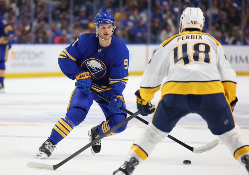 Mar 7, 2026; Buffalo, New York, USA;  Buffalo Sabres center Josh Norris (9) carries the puck up ice during the second period against the Nashville Predators at KeyBank Center. Mandatory Credit: Timothy T. Ludwig-Imagn Images