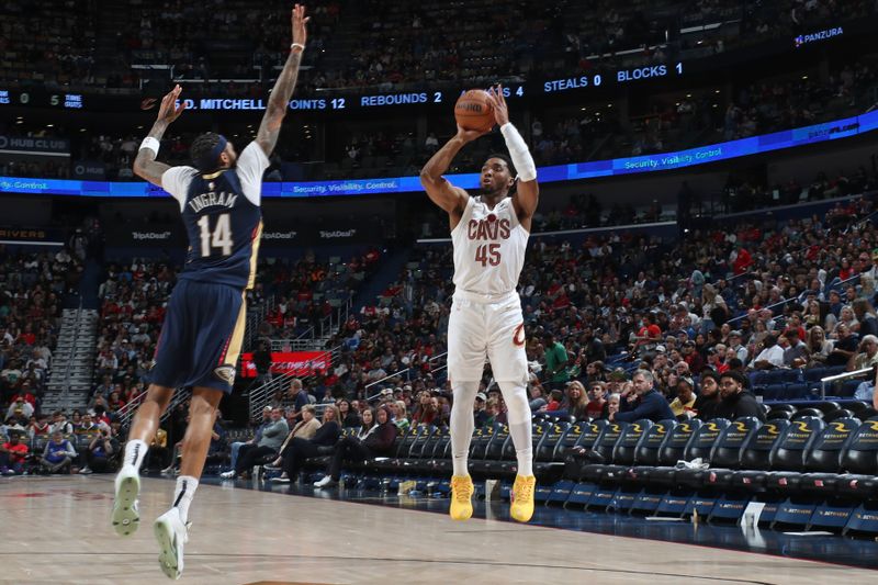 NEW ORLEANS, LA - MARCH 13: Donovan Mitchell #45 of the Cleveland Cavaliers three point basket during the game against the New Orleans Pelicans on March 13, 2024 at the Smoothie King Center in New Orleans, Louisiana. NOTE TO USER: User expressly acknowledges and agrees that, by downloading and or using this Photograph, user is consenting to the terms and conditions of the Getty Images License Agreement. Mandatory Copyright Notice: Copyright 2024 NBAE (Photo by Layne Murdoch Jr./NBAE via Getty Images)