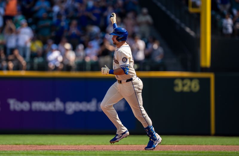 Aug 24, 2025; Seattle, Washington, USA; Seattle Mariners catcher Cal Raleigh (29) rounds the bases after hitting a two-run home run during the first inning against the Athletics at T-Mobile Park. Mandatory Credit: Stephen Brashear-Imagn Images
