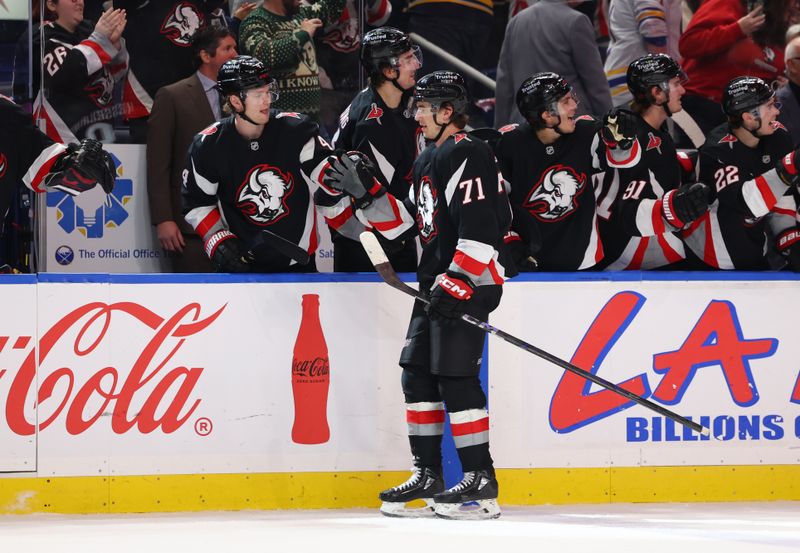 Dec 18, 2025; Buffalo, New York, USA;  Buffalo Sabres center Ryan McLeod (71) celebrates his goal with teammates during the third period against the Philadelphia Flyers at KeyBank Center. Mandatory Credit: Timothy T. Ludwig-Imagn Images