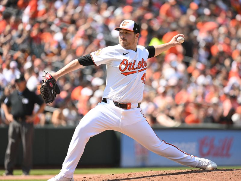 Apr 28, 2024; Baltimore, Maryland, USA;  Baltimore Orioles relief pitcher Keegan Akin (45) delivers a pitch during the fifth inning against the Oakland Athletics at Oriole Park at Camden Yards. Mandatory Credit: James A. Pittman-USA TODAY Sports