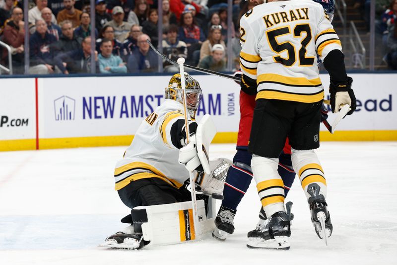 Mar 29, 2026; Columbus, Ohio, USA; Boston Bruins goalie Jeremy Swayman (1) makes a save against the Columbus Blue Jackets during the second period at Nationwide Arena. Mandatory Credit: Russell LaBounty-Imagn Images
