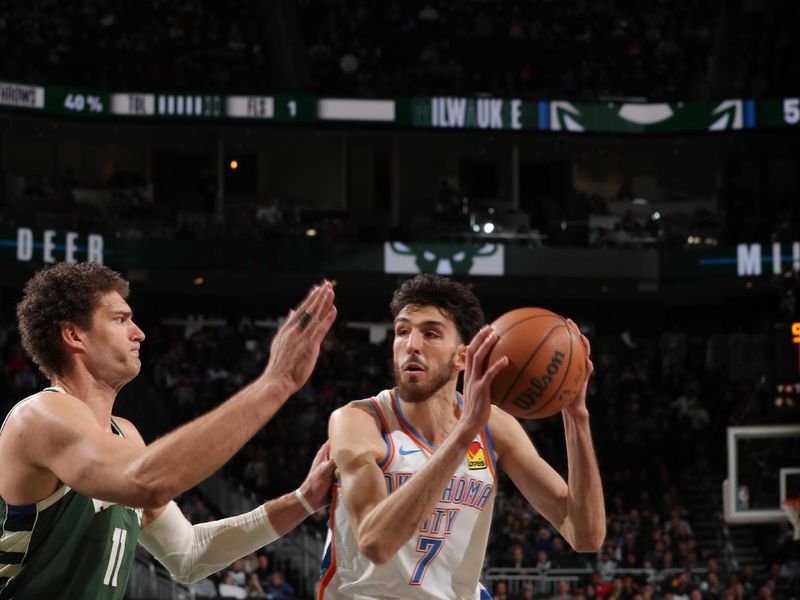 MILWAUKEE, WI - MARCH 24: Chet Holmgren #7 of the Oklahoma City Thunder handles the ball during the game against the Milwaukee Bucks on March 24, 2024 at the Fiserv Forum Center in Milwaukee, Wisconsin. NOTE TO USER: User expressly acknowledges and agrees that, by downloading and or using this Photograph, user is consenting to the terms and conditions of the Getty Images License Agreement. Mandatory Copyright Notice: Copyright 2024 NBAE (Photo by Gary Dineen/NBAE via Getty Images).