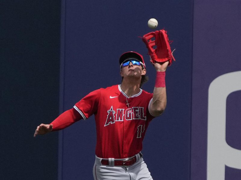 Mar 18, 2024; Phoenix, Arizona, USA; Los Angeles Angels right fielder Mickey Moniak (16) makes the running catch for an out against the Milwaukee Brewers in the second inning at American Family Fields of Phoenix. Mandatory Credit: Rick Scuteri-USA TODAY Sports