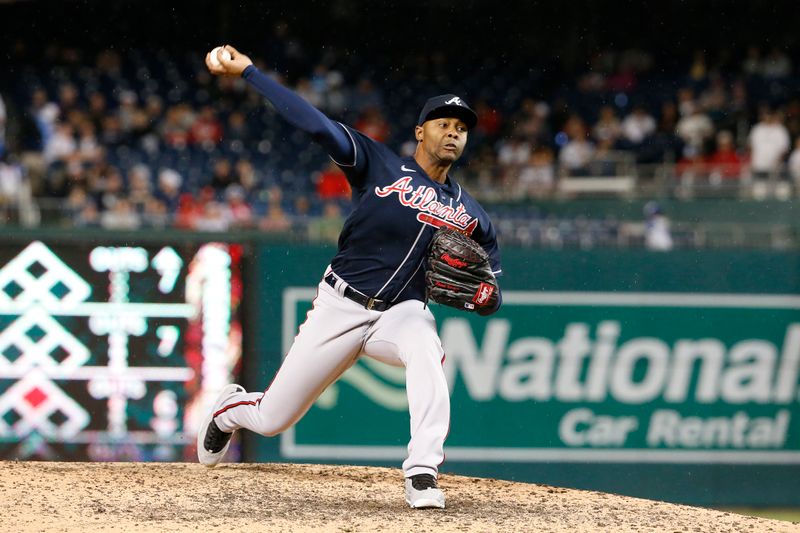 Sep 22, 2023; Washington, District of Columbia, USA; Atlanta Braves relief pitcher Raisel Iglesias (26) throws the ball in the ninth inning against the Washington Nationals at Nationals Park. Mandatory Credit: Amber Searls-USA TODAY Sports