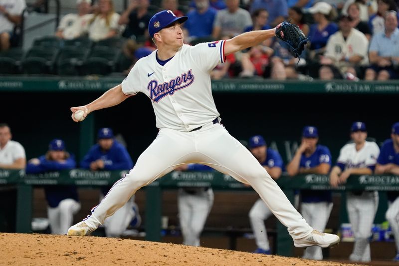 Apr 25, 2024; Arlington, Texas, USA; Texas Rangers pitcher Josh Sborz (66) throws to the plate during the ninth inning against the Seattle Mariners at Globe Life Field. Mandatory Credit: Raymond Carlin III-USA TODAY Sports