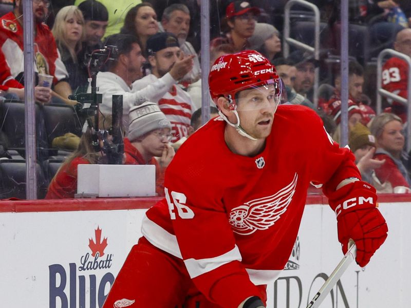 Dec 9, 2023; Detroit, Michigan, USA; Detroit Red Wings defenseman Jeff Petry (46) handles the puck during the first period at Little Caesars Arena. Mandatory Credit: Brian Bradshaw Sevald-USA TODAY Sports