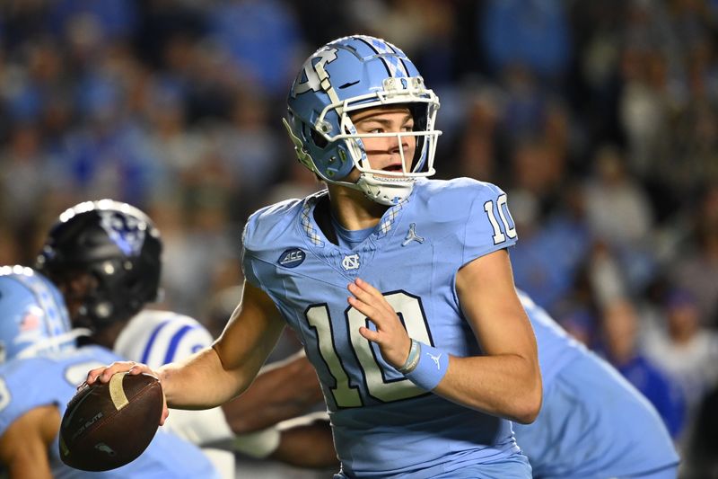 Nov 11, 2023; Chapel Hill, North Carolina, USA; North Carolina Tar Heels quarterback Drake Maye (10) looks to pass in the first quarter at Kenan Memorial Stadium. Mandatory Credit: Bob Donnan-USA TODAY Sports