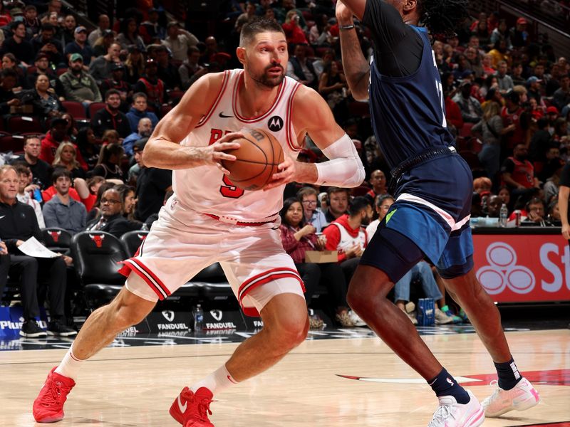 CHICAGO, IL - OCTOBER 19: Nikola Vucevic #9 of the Chicago Bulls drives to the basket during the game against the Minnesota Timberwolves on October 19, 2023 at United Center in Chicago, Illinois. NOTE TO USER: User expressly acknowledges and agrees that, by downloading and or using this photograph, User is consenting to the terms and conditions of the Getty Images License Agreement. Mandatory Copyright Notice: Copyright 2023 NBAE (Photo by Jeff Haynes/NBAE via Getty Images)